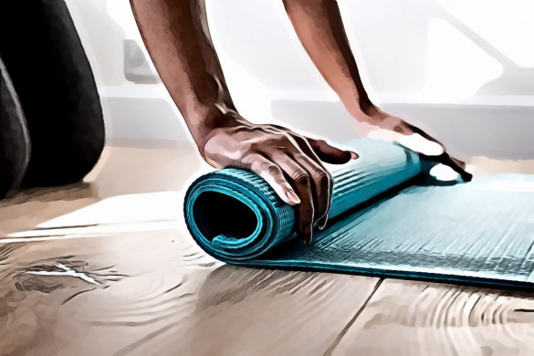 Person Rolling Green Gym Mat
