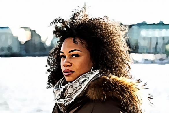 Curly Head Woman Wearing Black and Brown Coat