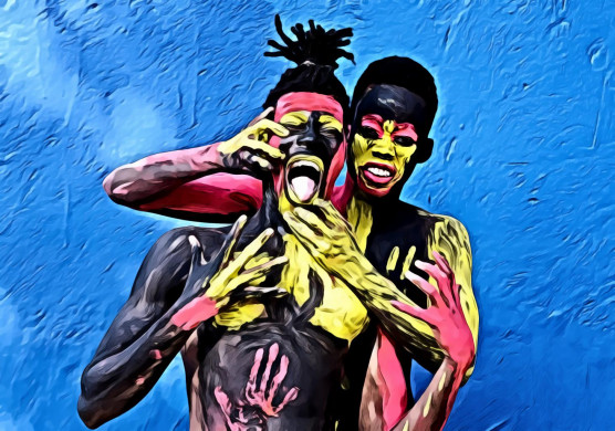 Man Beside a Woman in Body Paint