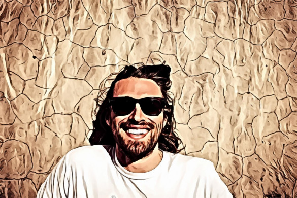 Man Wearing White Crew-neck Shirt Beside Wall