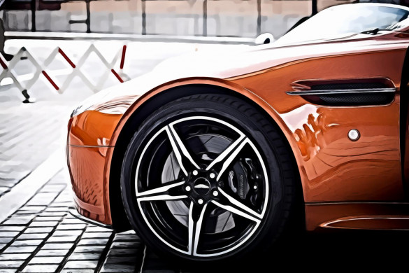 Orange Car Parked Near Grey Triangular Sign during Daytime