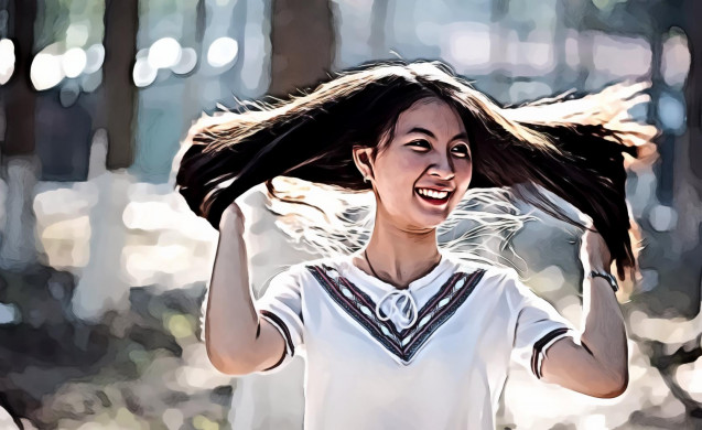 Smiling Girl in White T-Shirt