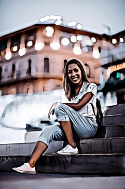 Smiling Woman Sitting in Stairs