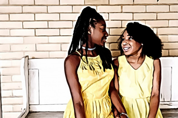 Two Girls Wearing Yellow Sleeveless Dresses