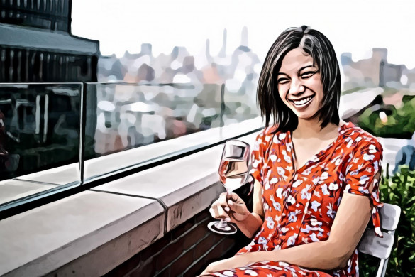 Woman Sitting on Chair Holding Wine Glass