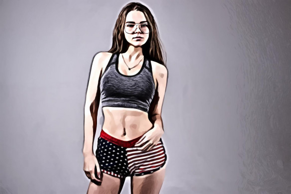 Woman Wearing Grey Sports Bra and U.s. Flag Printed Dolphin Shorts