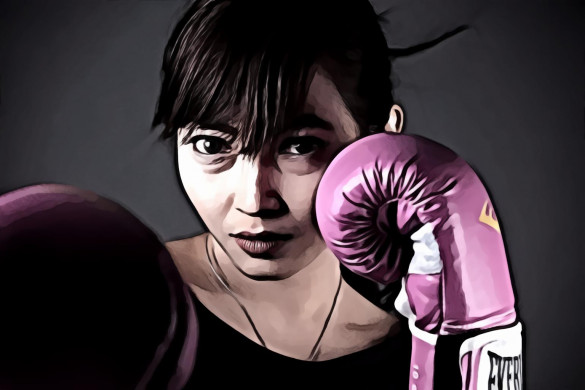 Woman Wearing Purple Boxing Gloves