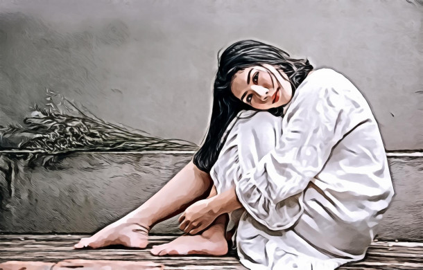 Woman Wearing White Dress Sitting on Wooden Floor