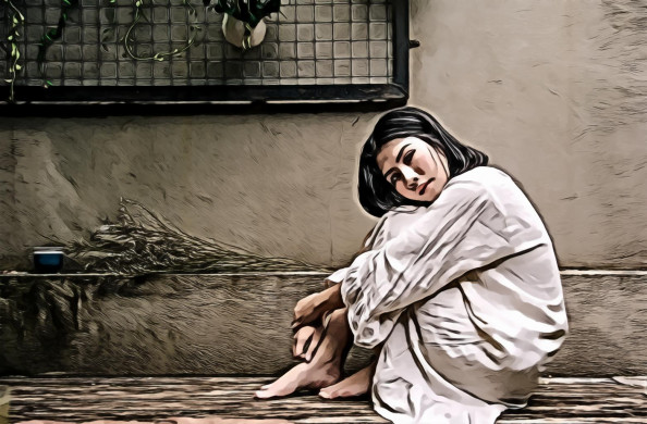 Portrait of Woman Sitting Down on Floor