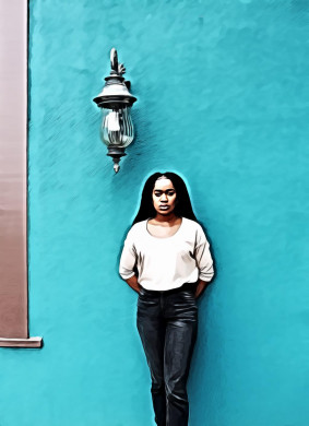 Woman Standing Against Teal Wall Near Sconce