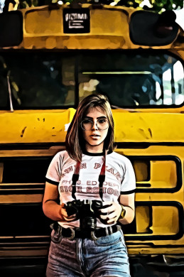 Portrait of Woman Standing in Front of a Bus Holding a Dslr Camera