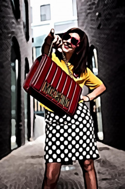 Woman Wearing Yellow Crew-neck T-shirt While Holding Red Handbag