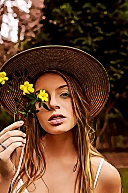Woman in Wearing Straw Hat Holding Yellow Flowers Near Her Face