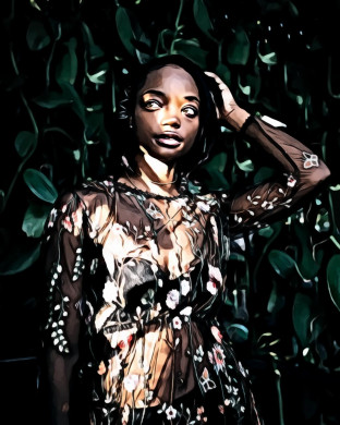 Woman Near Leaf Wall