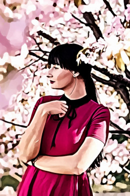 Woman Standing Beside Sakura Tree