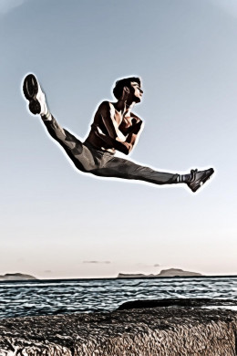 Man Doing Stunt Near Body of Water