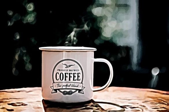 White coffee mug on brown surface