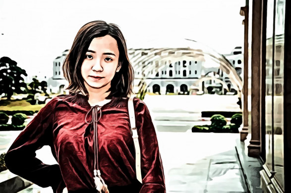 Woman in Red Long-sleeved Top Standing Outdoors