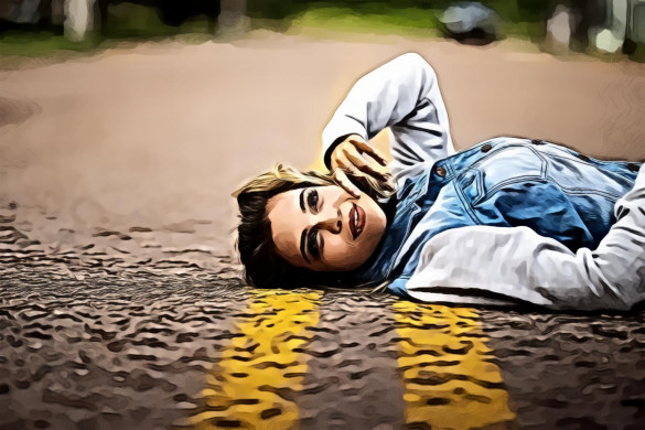 Woman Lying on Road