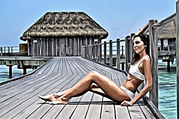 Woman Sitting on Gray Wooden Resort Bridge