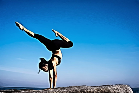 Woman With Arms Outstretched Against Blue Sky