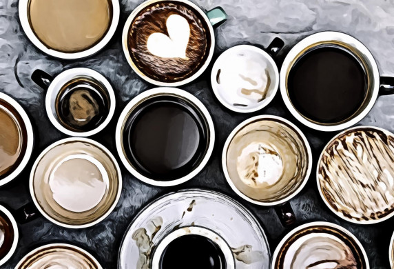 Top view photo of ceramic mugs filled with coffees