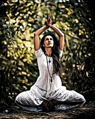 Woman squatting on ground while raising both hands