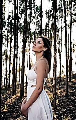 Woman standing at forest