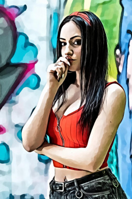 Woman standing near graffitti