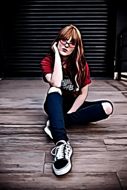 Woman wearing red crew neck top sitting on brown plankboard