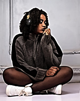 Woman sitting in front of white wall