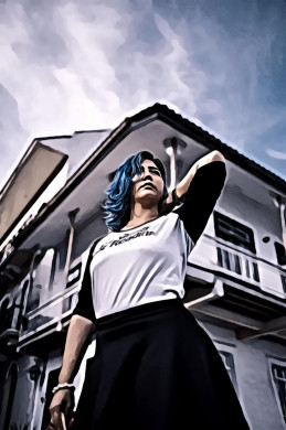 Woman standing in front of white