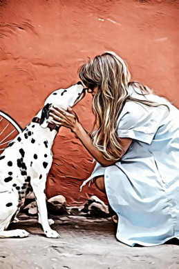Black and white dalmatian licking face of woman
