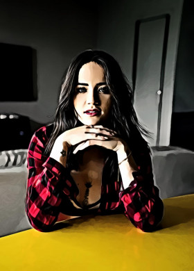 Woman in red and black checked top