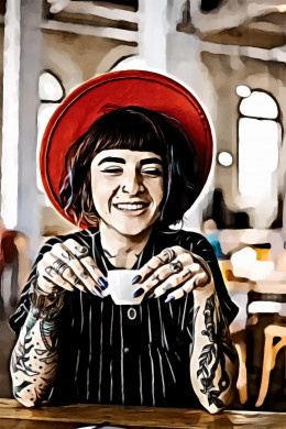 Woman wearing black and white striped button up shirt and red hat holding white ceramic teacup