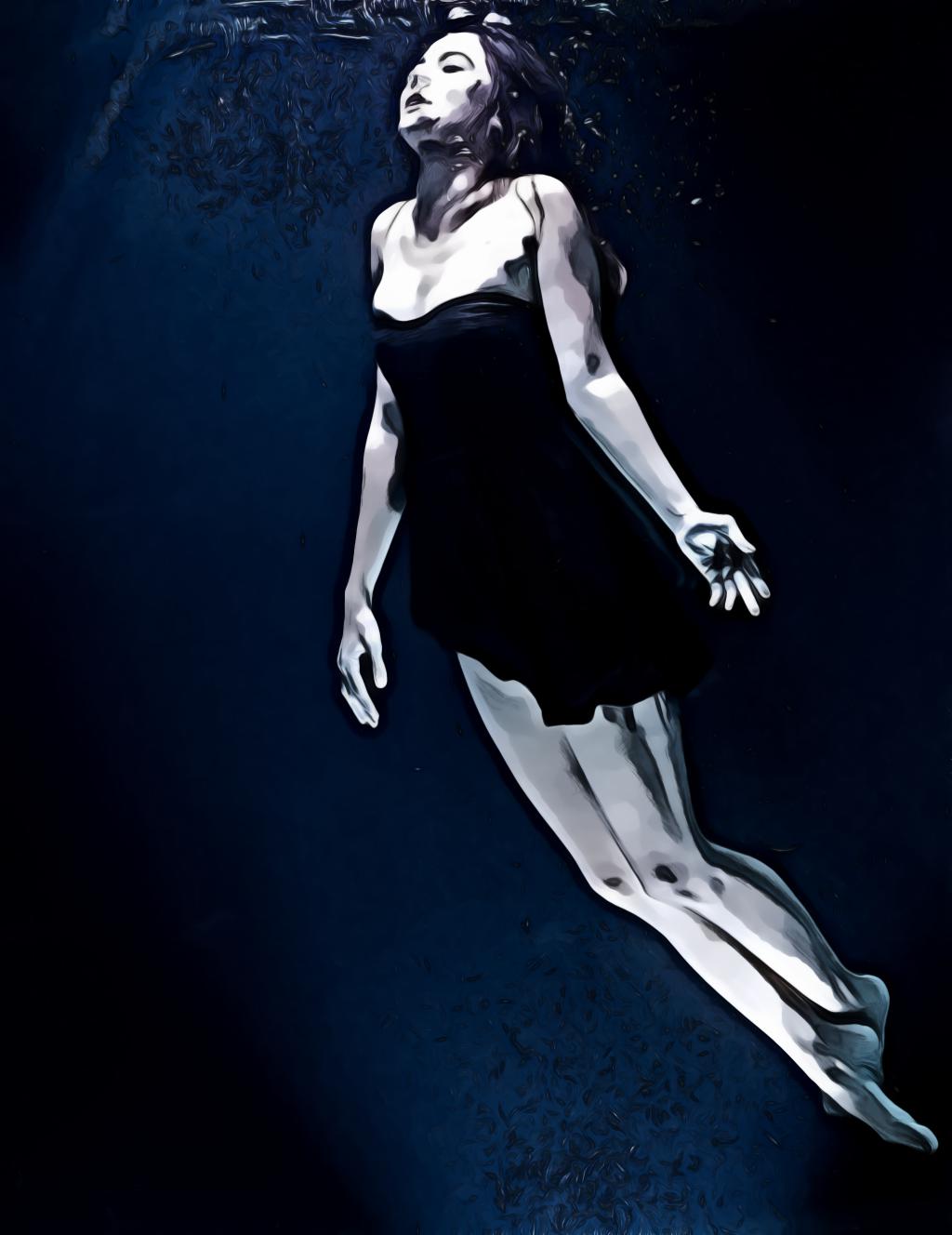 Woman Wearing Short Black Dress Swimming Underwater