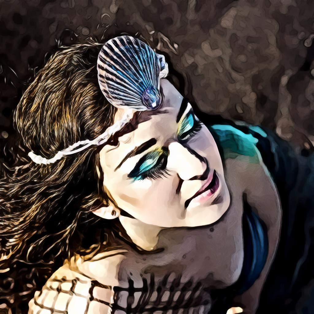 Woman in mermaid costume posing for photo