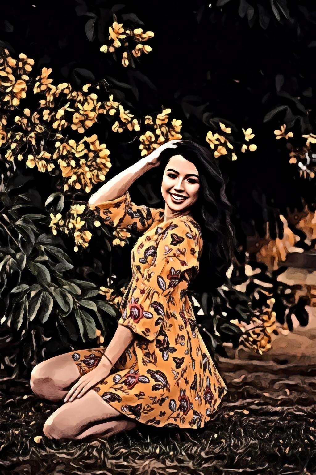 Smiling woman wearing orange dress sitting near flowers