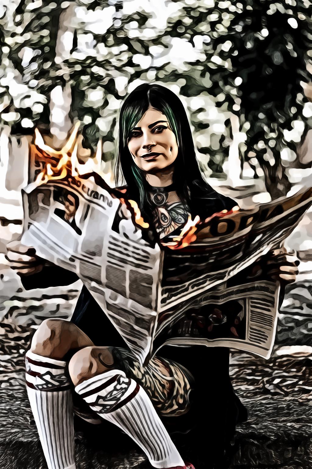 Woman holding burning newspaper
